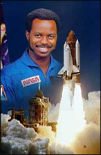 Ronald McNair with space shuttle in foreground